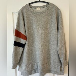 Lovely Melody Gray Sweater with Red and Black Accents
